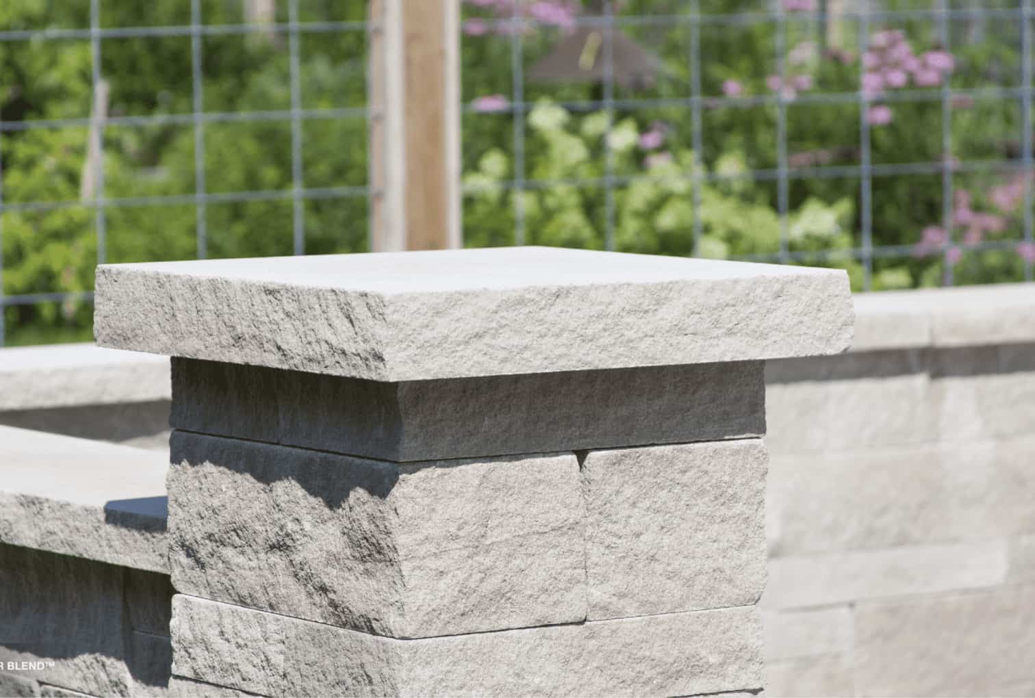 Indiana limestone pier caps on garden wall entrance, residential exterior, Tulip Precast