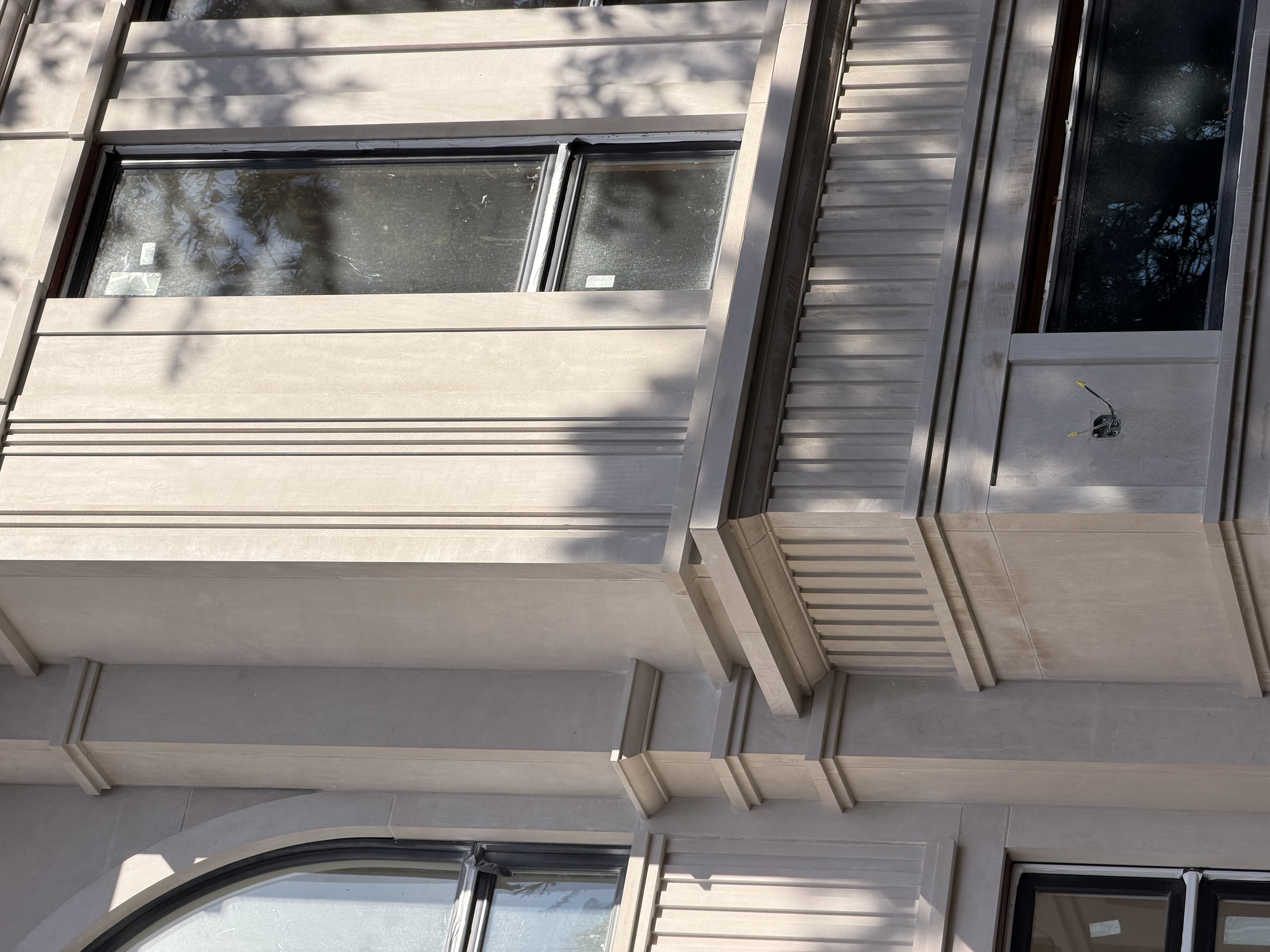 Indiana limestone banding on commercial masonry, Etobicoke